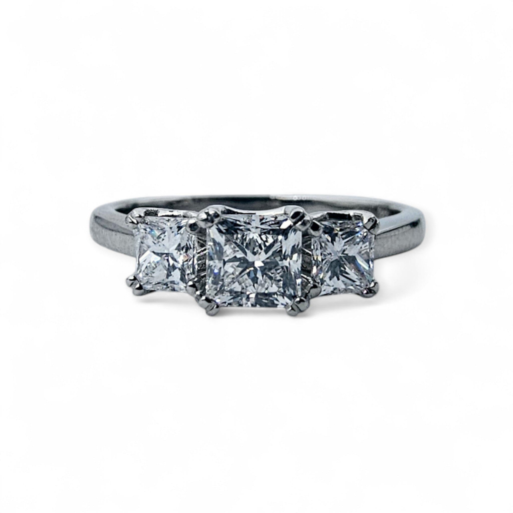 Three stone diamond engagement ring