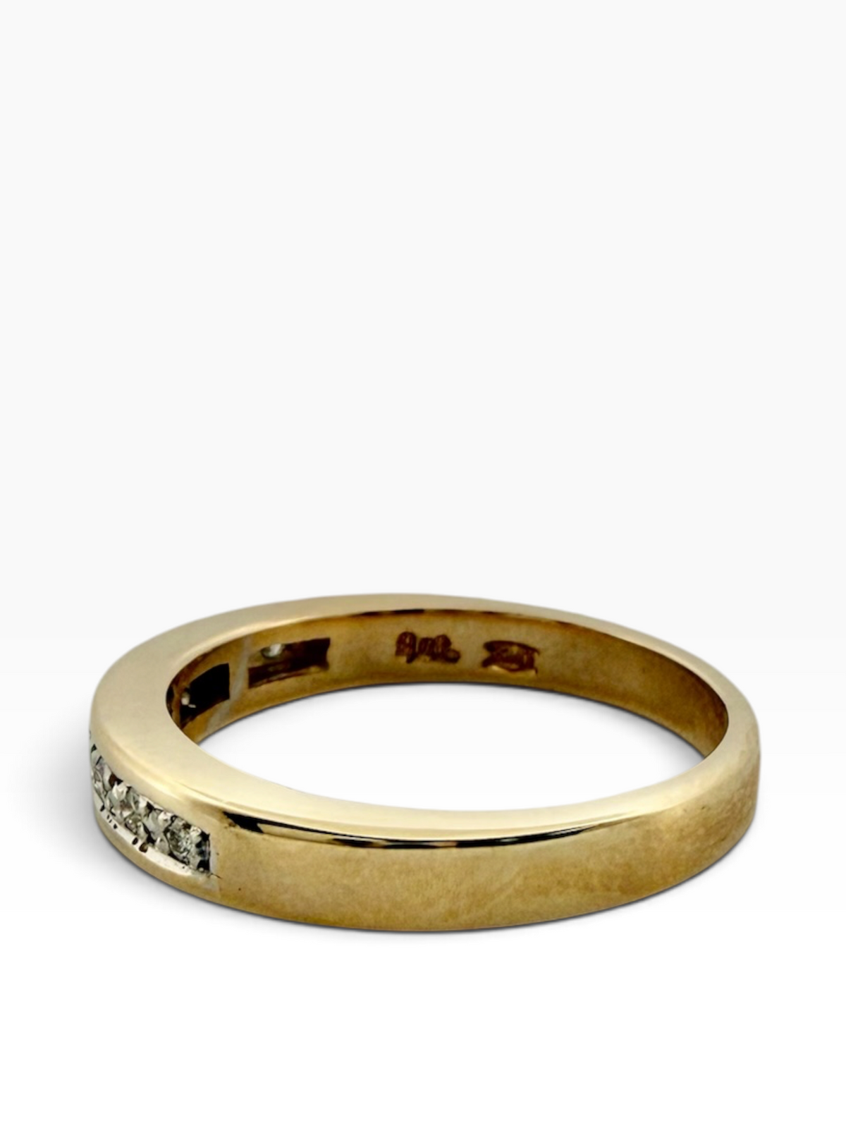 A diamond set wedding ring