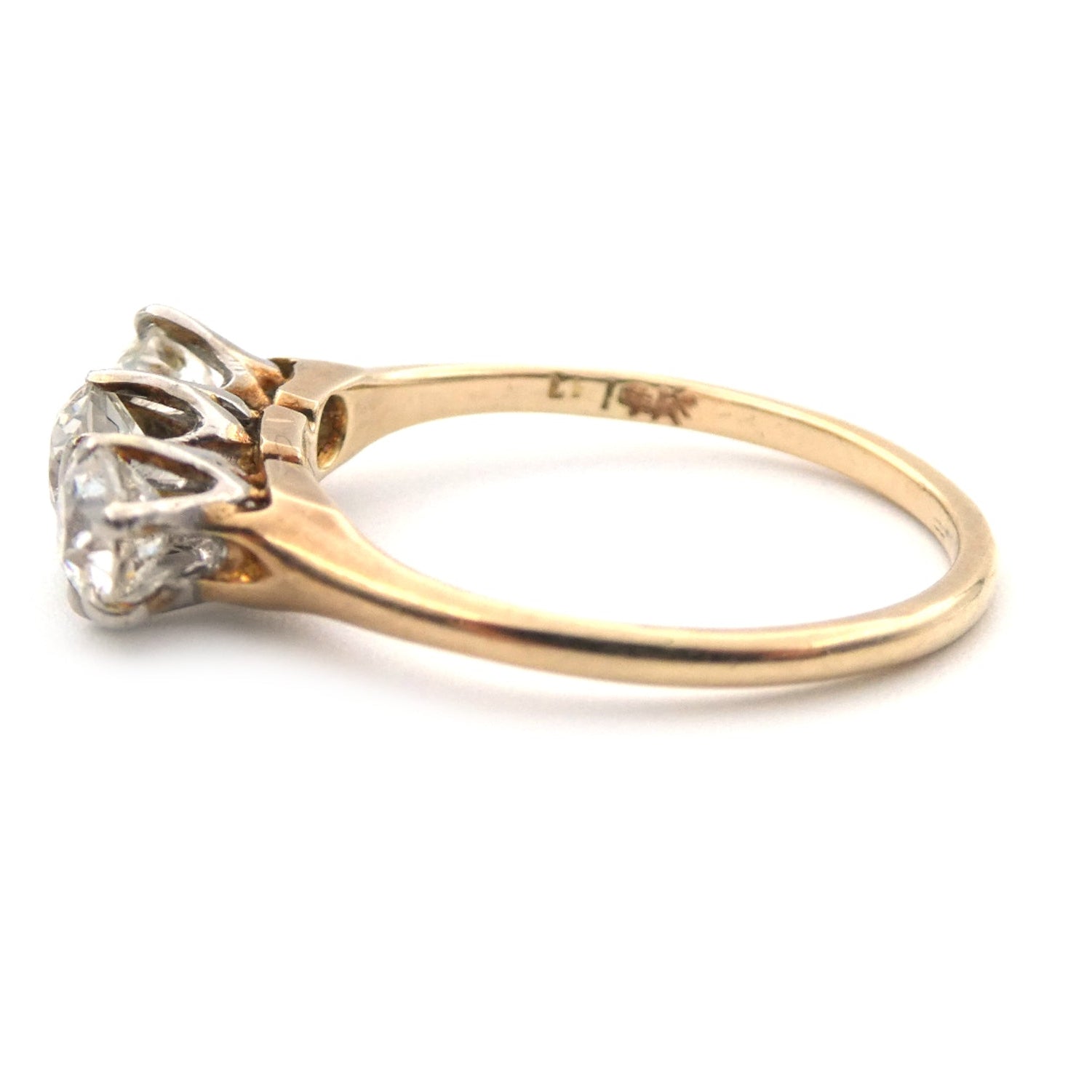 A vintage three stone diamond ring