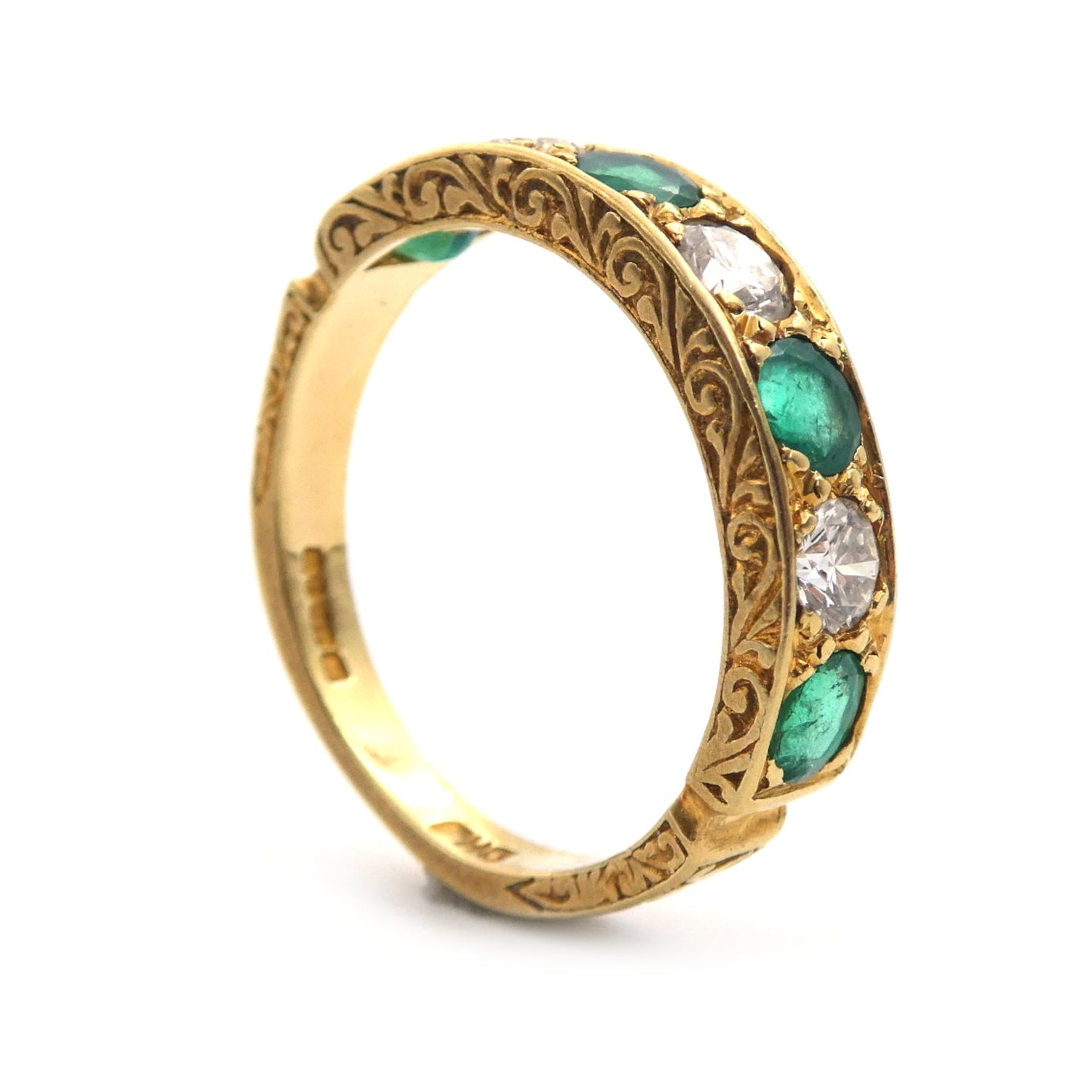 An Emerald and diamond dress ring