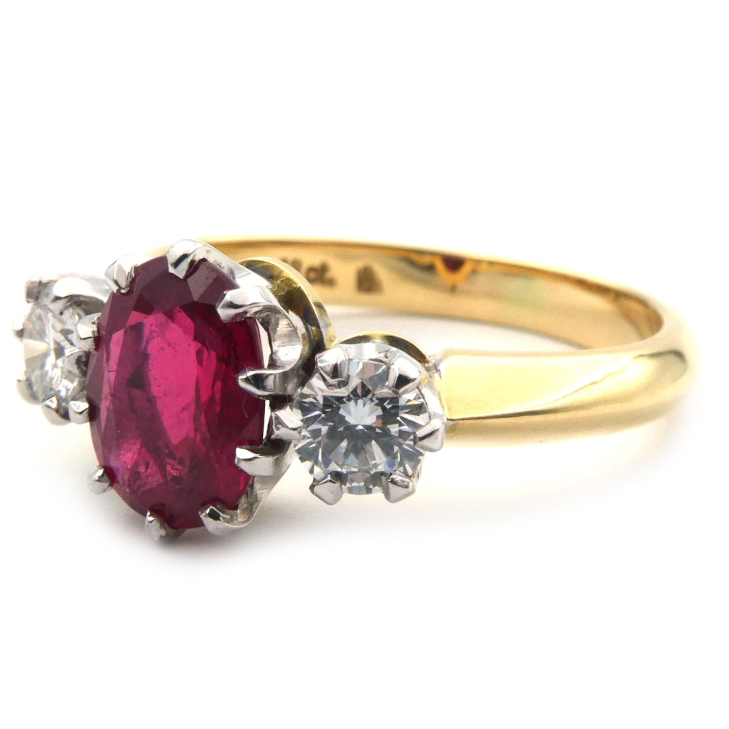 Ruby and diamond three stone ring