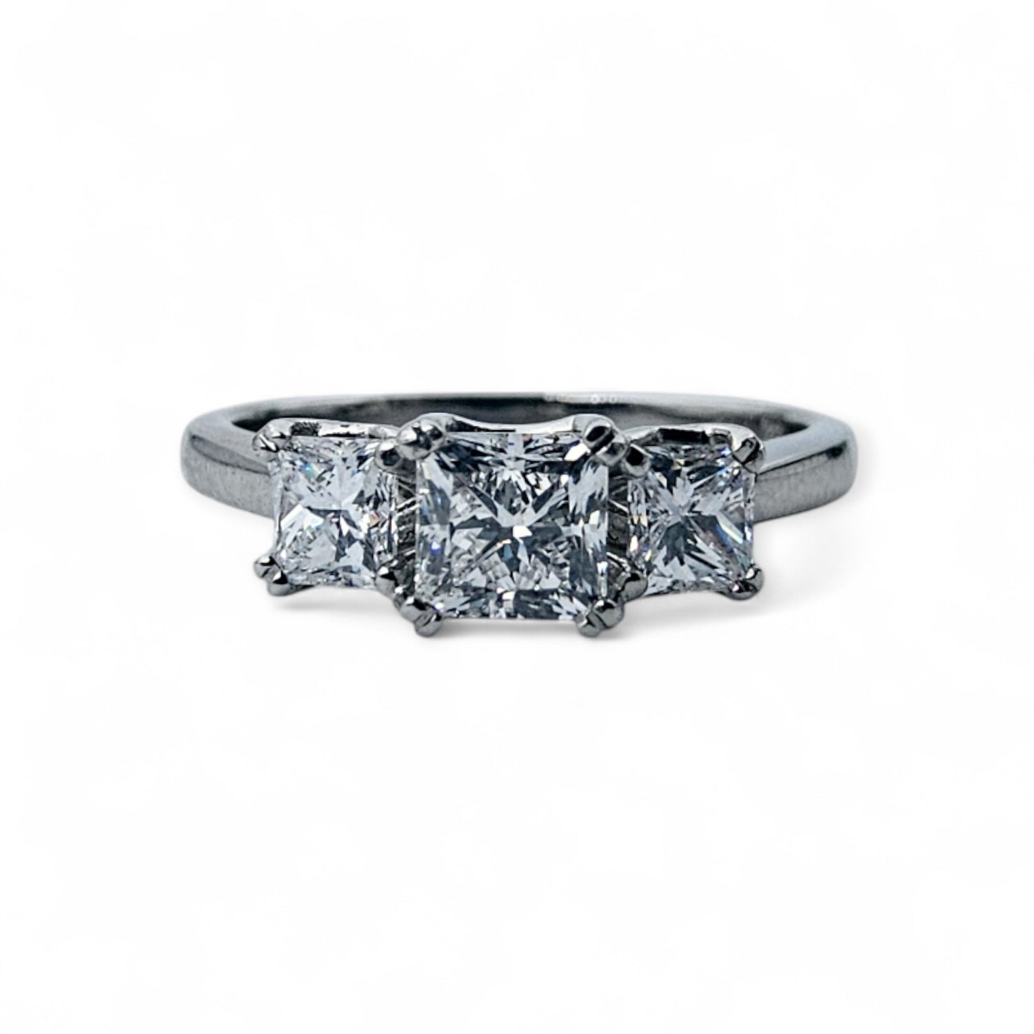 Three stone diamond engagement ring