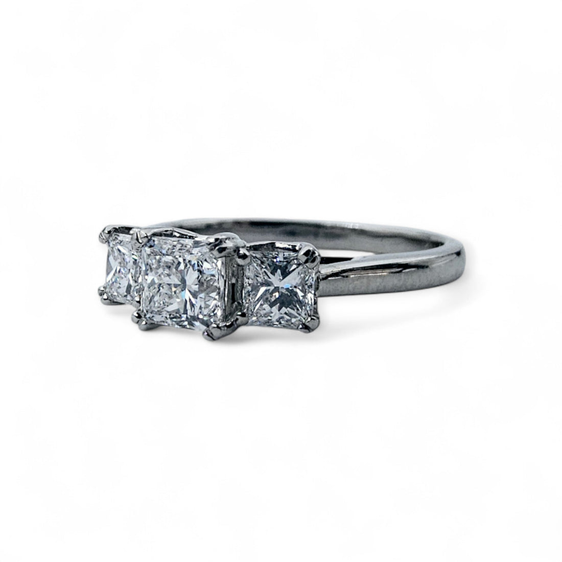 Three stone diamond engagement ring