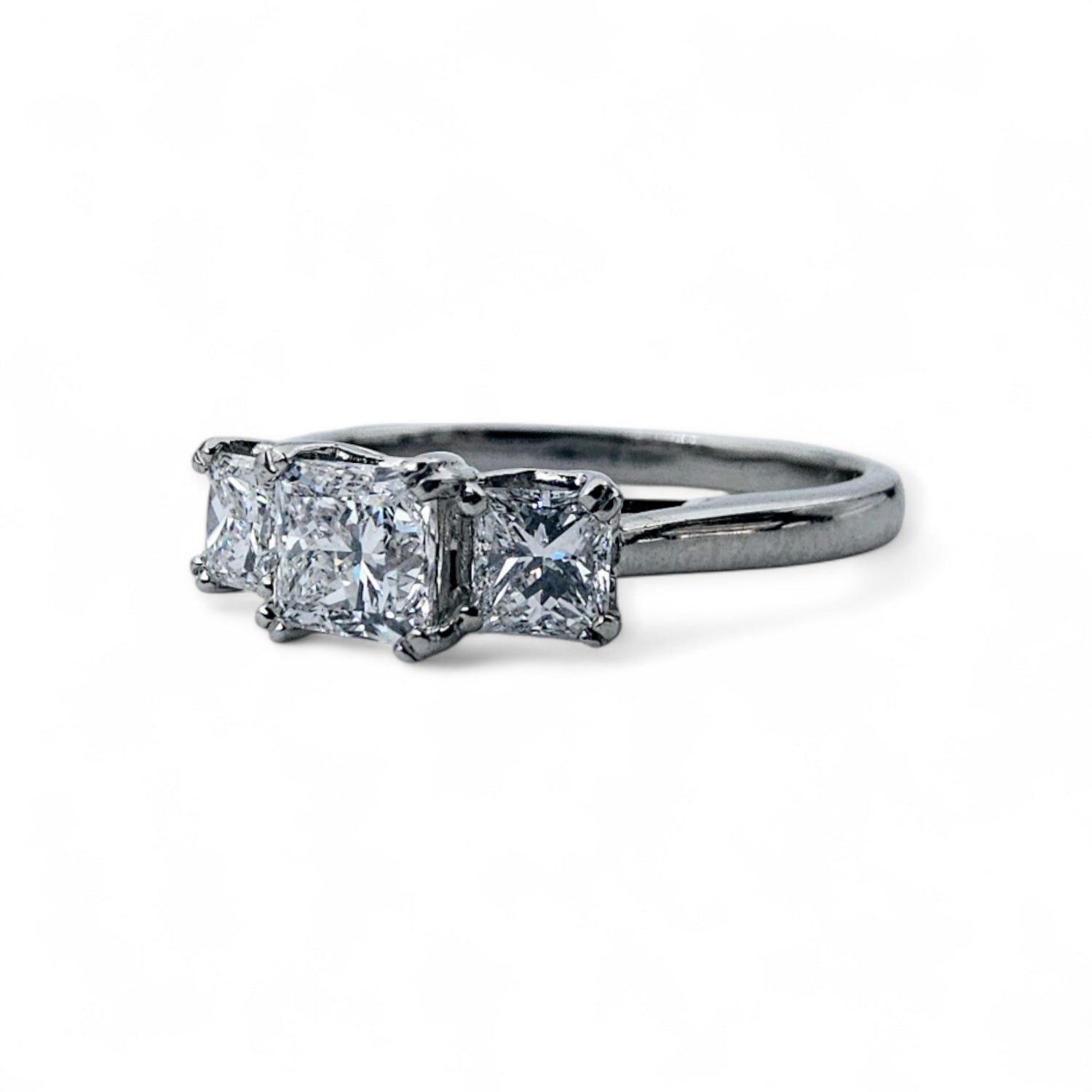 Three stone diamond engagement ring