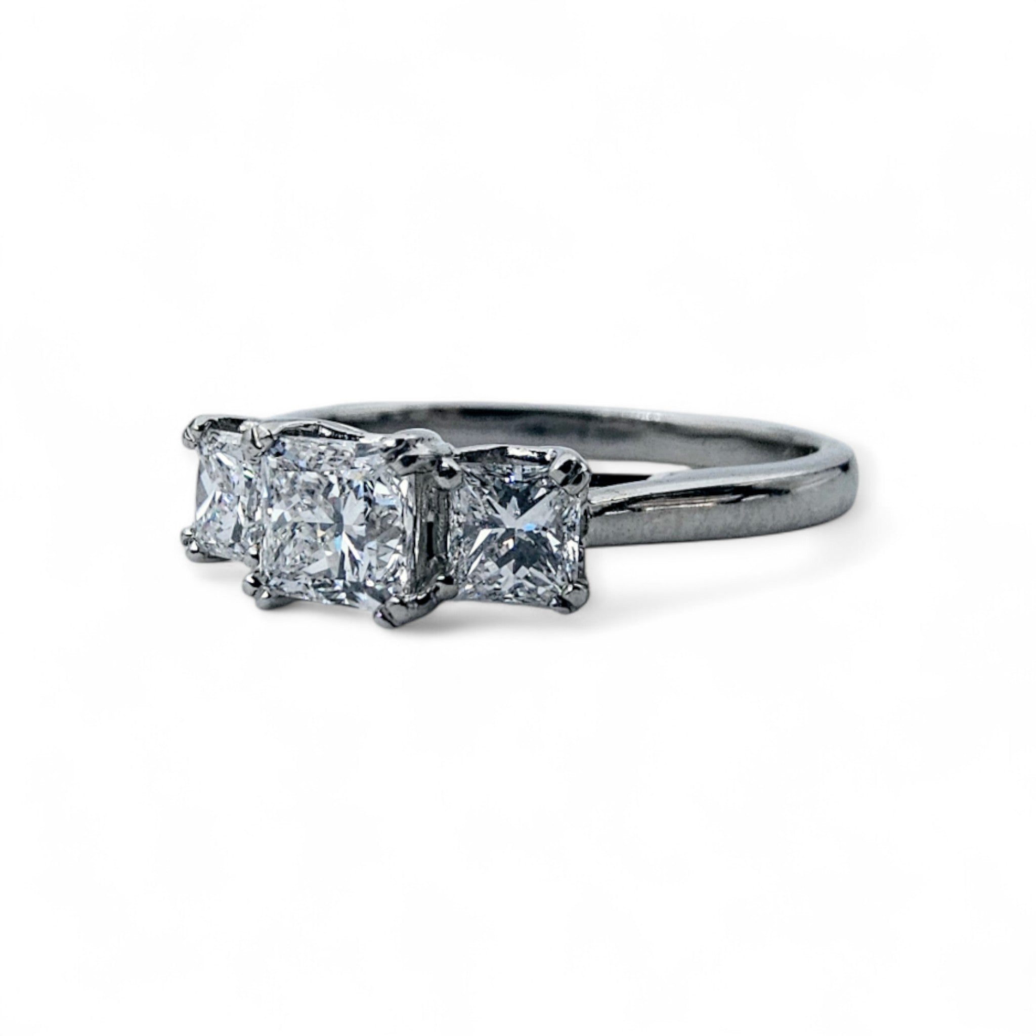 Three stone diamond engagement ring