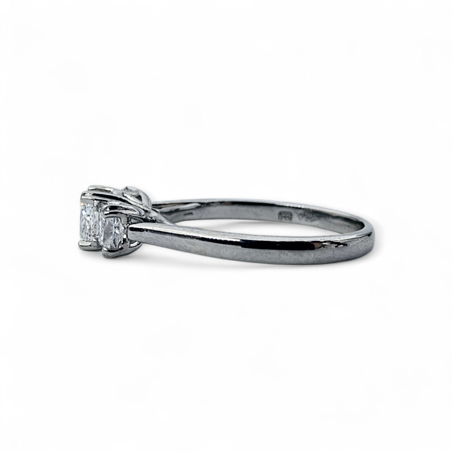 Three stone diamond engagement ring