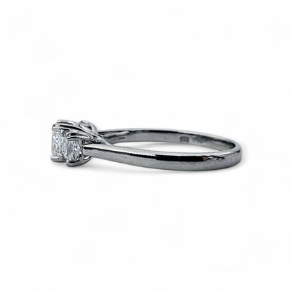 Three stone diamond engagement ring