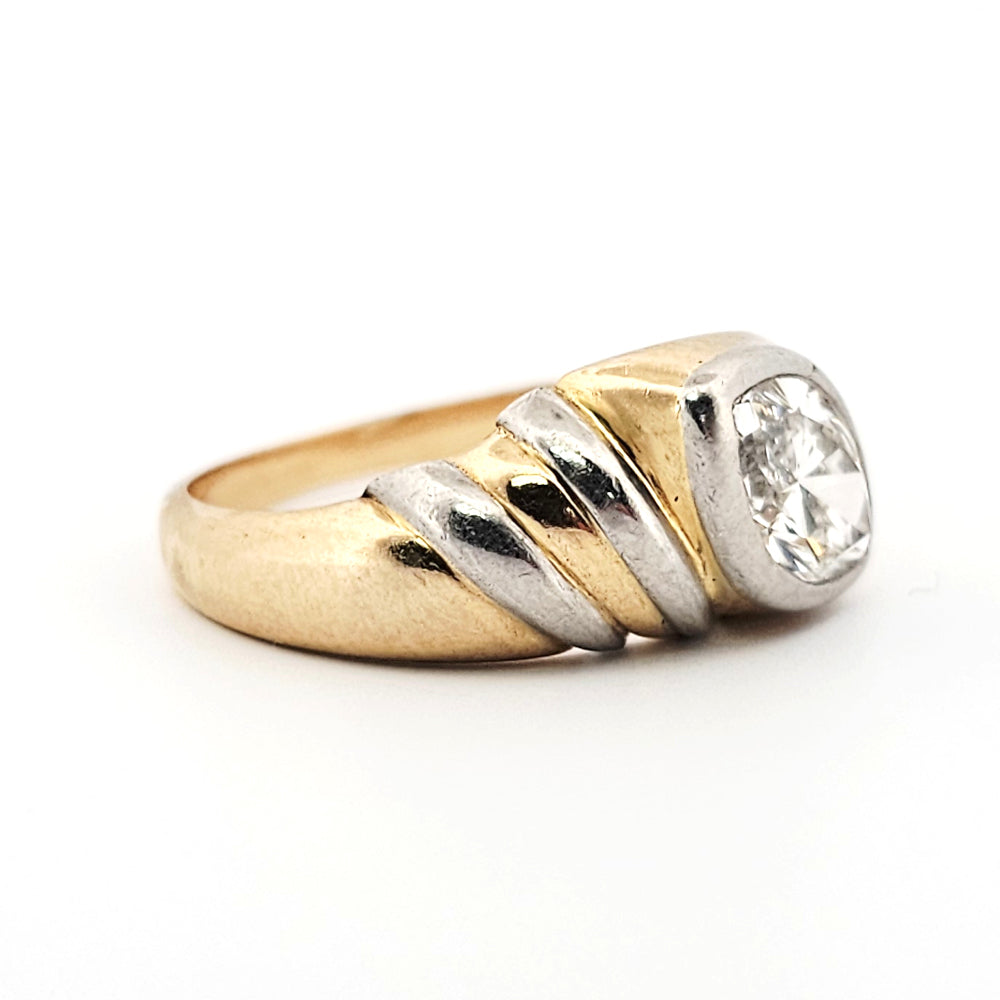 A marquise brilliant cut diamond modern solitaire ring