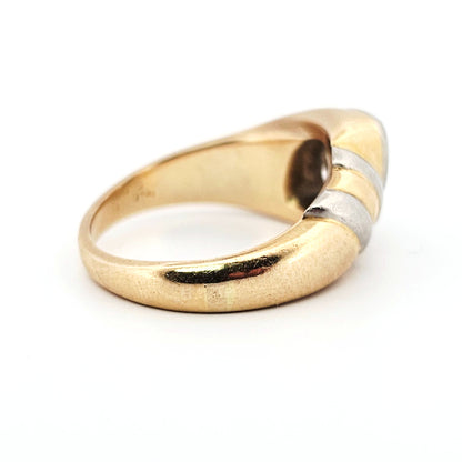 A marquise brilliant cut diamond modern solitaire ring