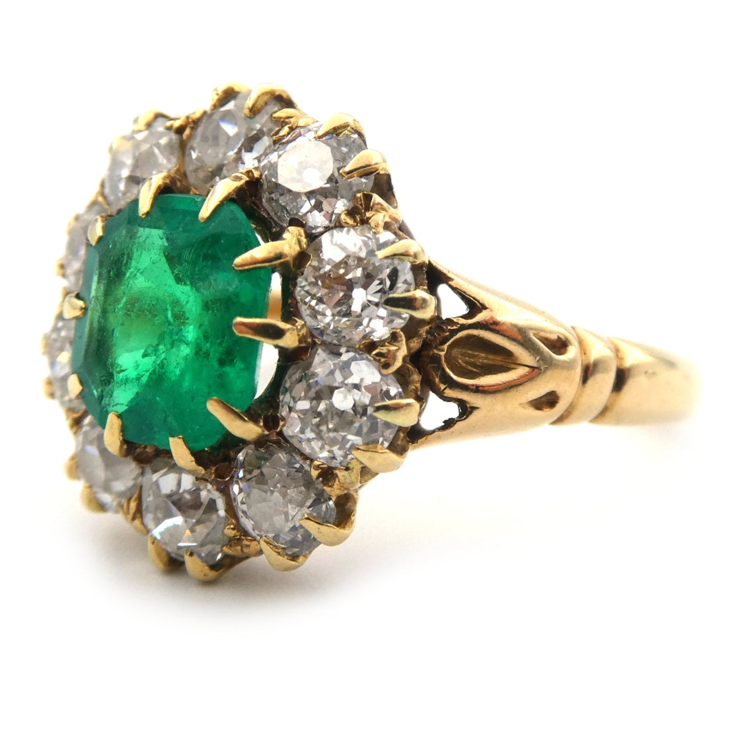 An Emerald and diamond cluster ring