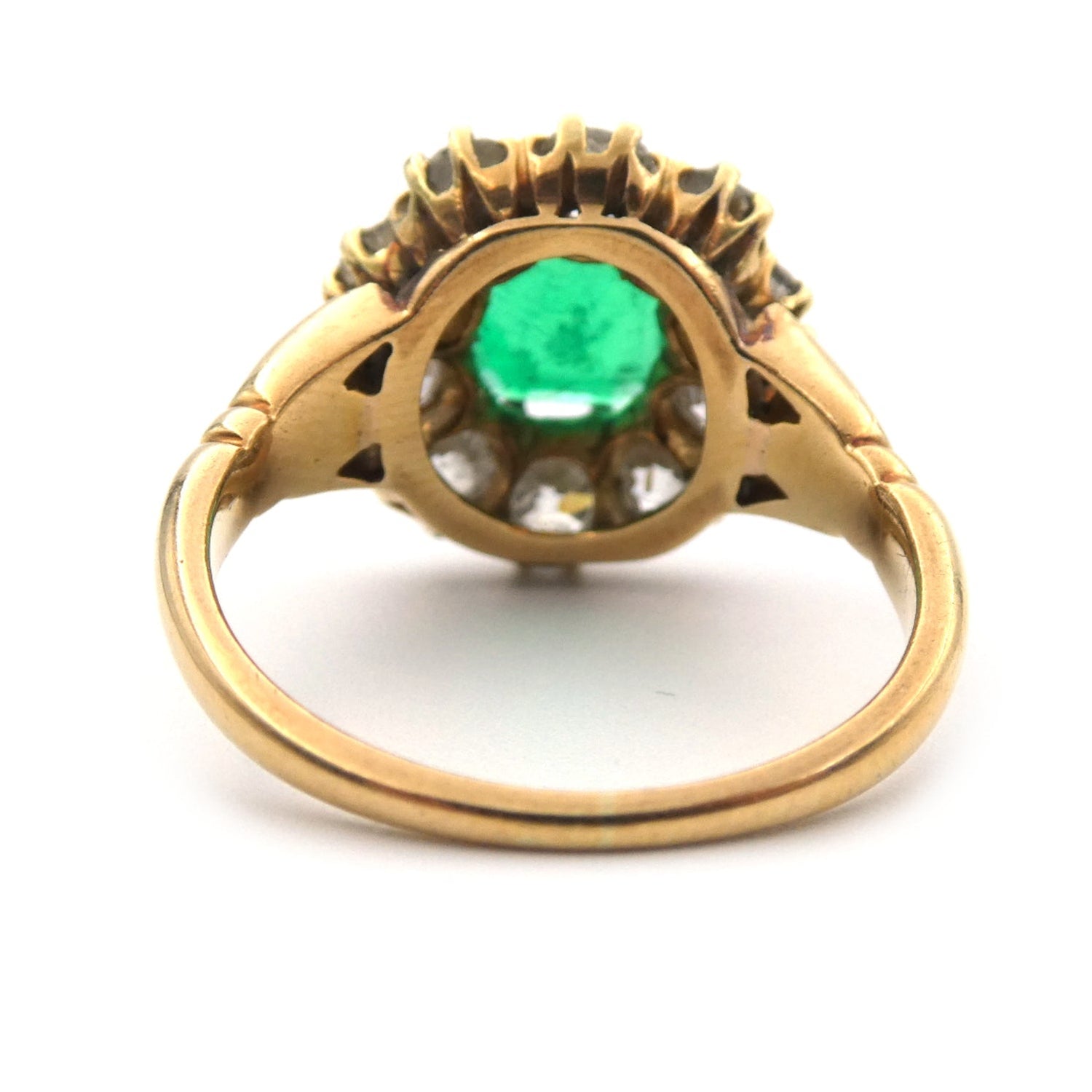 An Emerald and diamond cluster ring