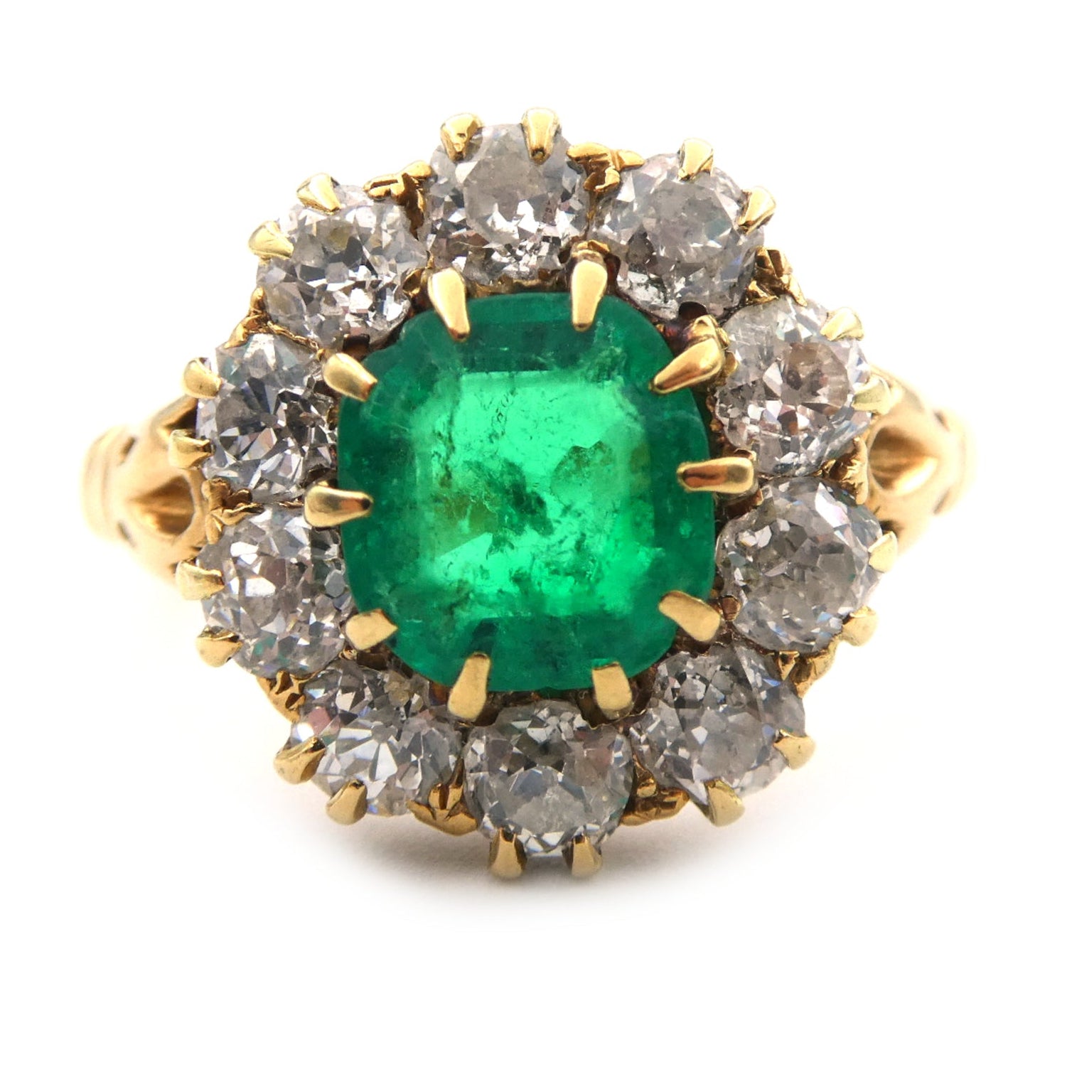 An Emerald and diamond cluster ring