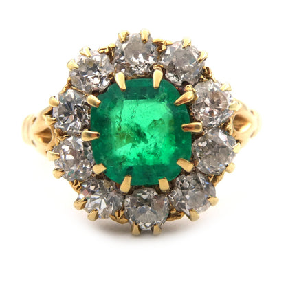 An Emerald and diamond cluster ring