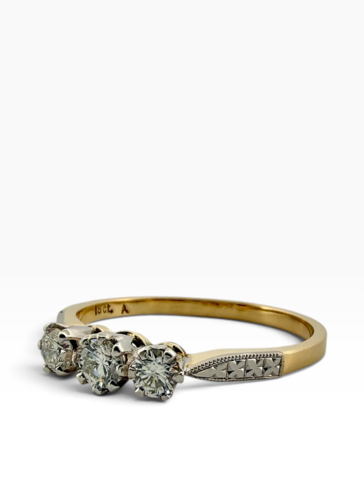 Diamond set three stone ring