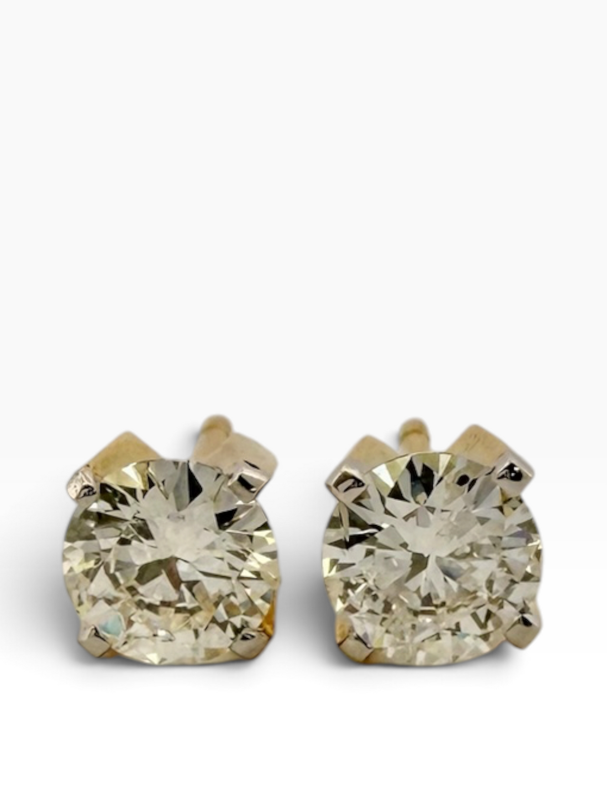 Solitaire diamond stud earrings