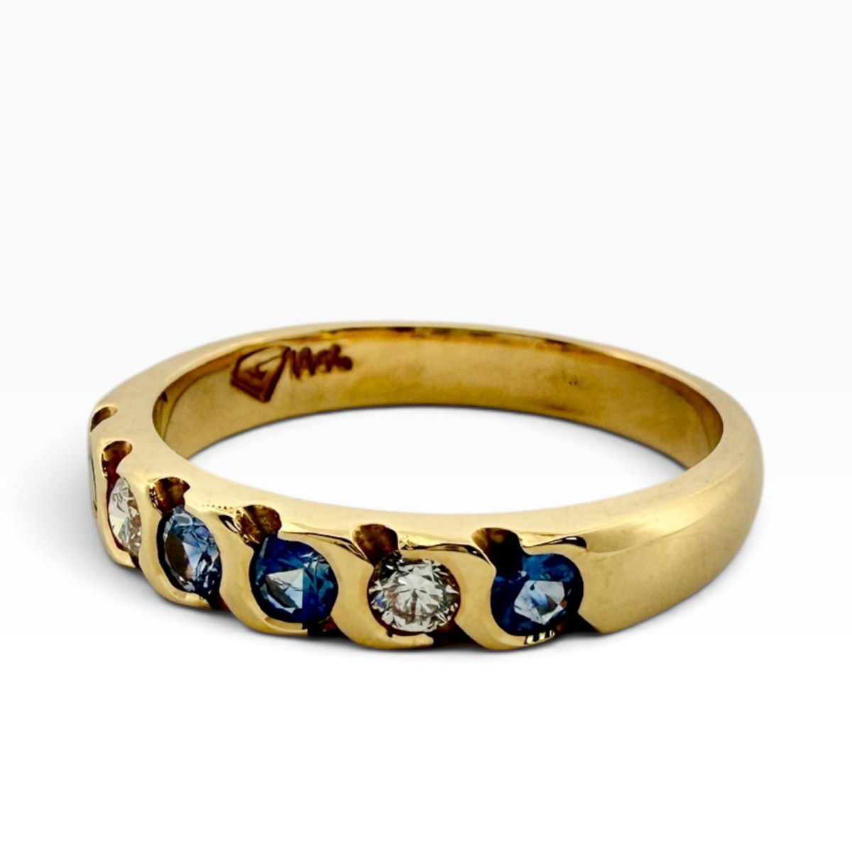 Sapphire and diamond anniversary ring