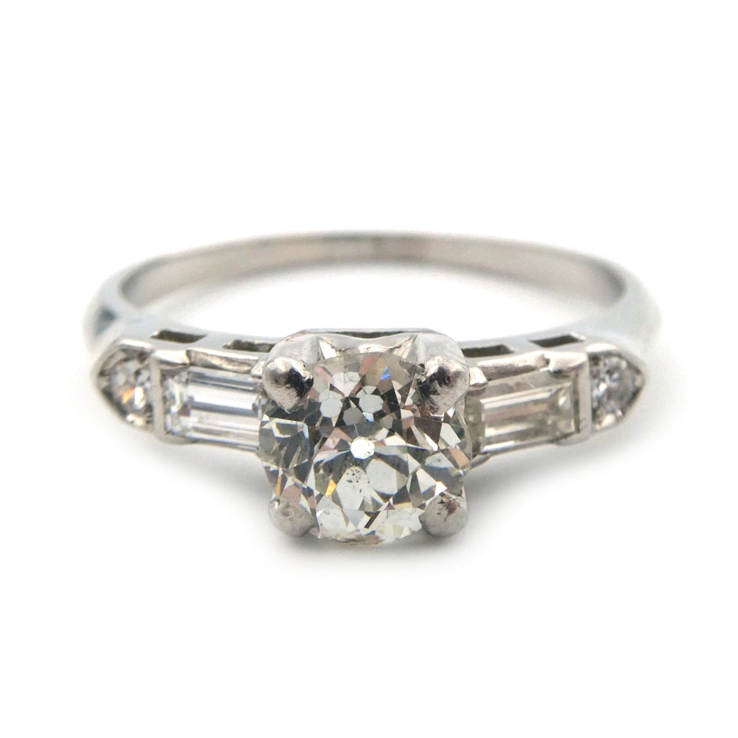 An Art Deco styled solitaire diamond ring