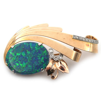 A vintage opal and diamond set spray brooch