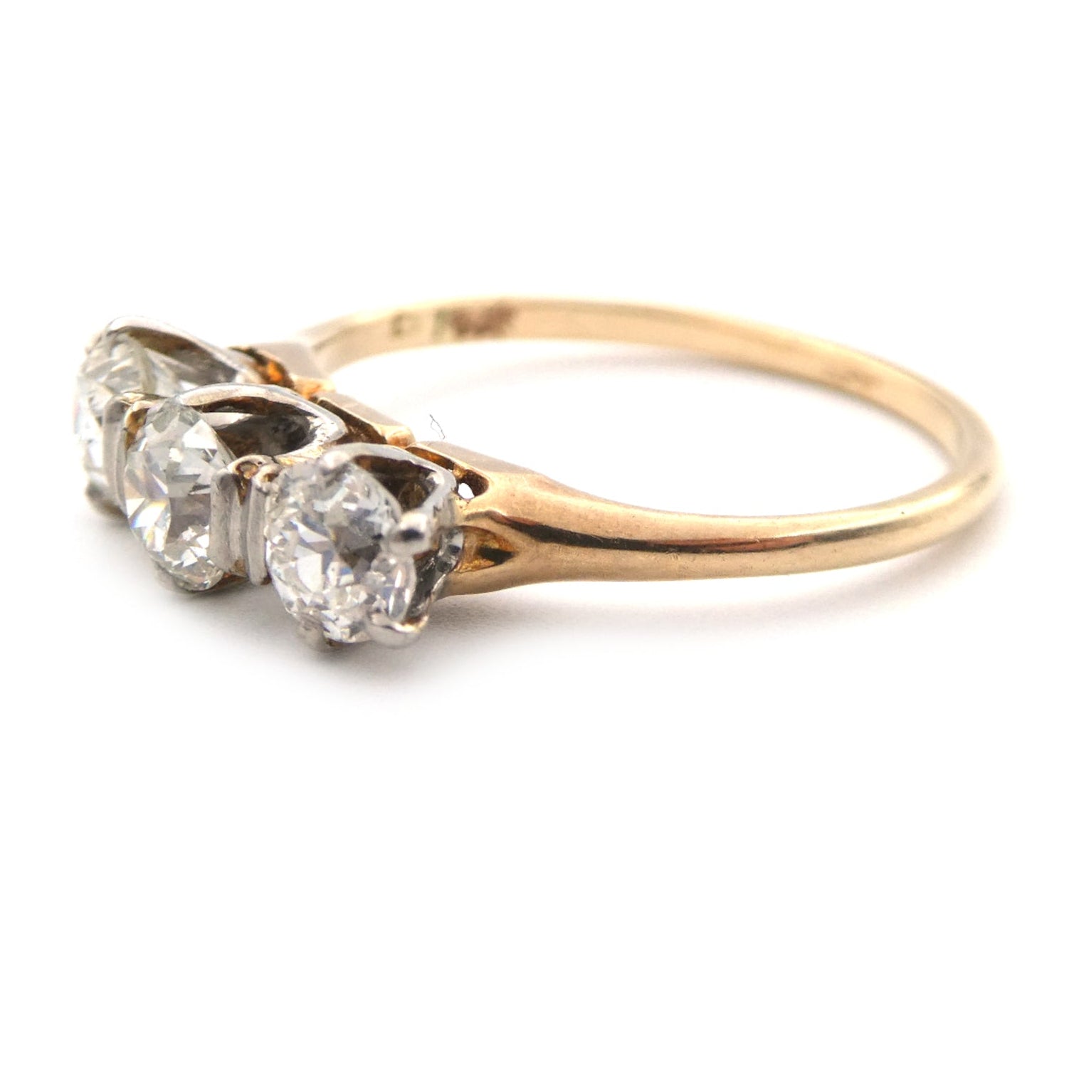 A vintage three stone diamond ring