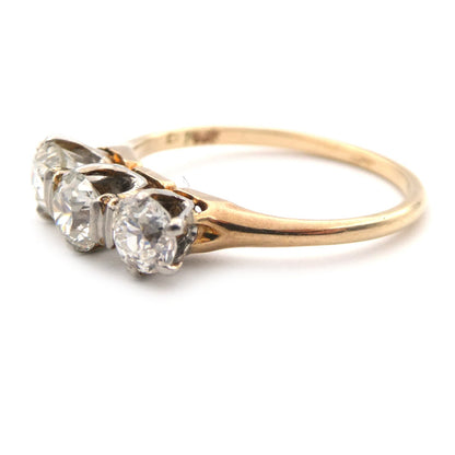 A vintage three stone diamond ring