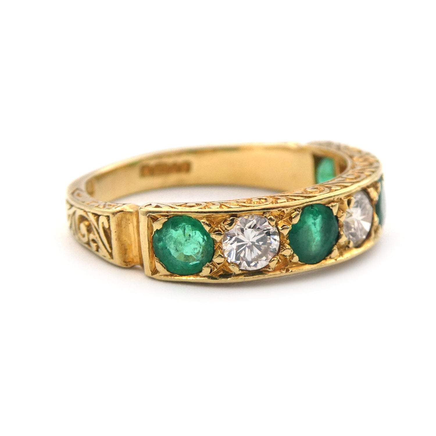An Emerald and diamond dress ring