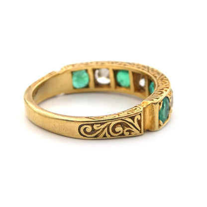 An Emerald and diamond dress ring