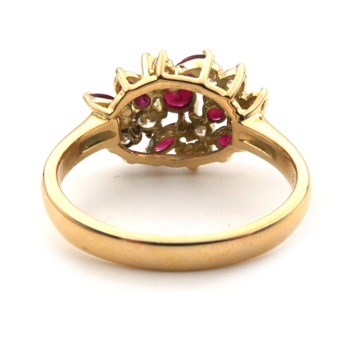 Vintage styled ruby and diamond cluster ring