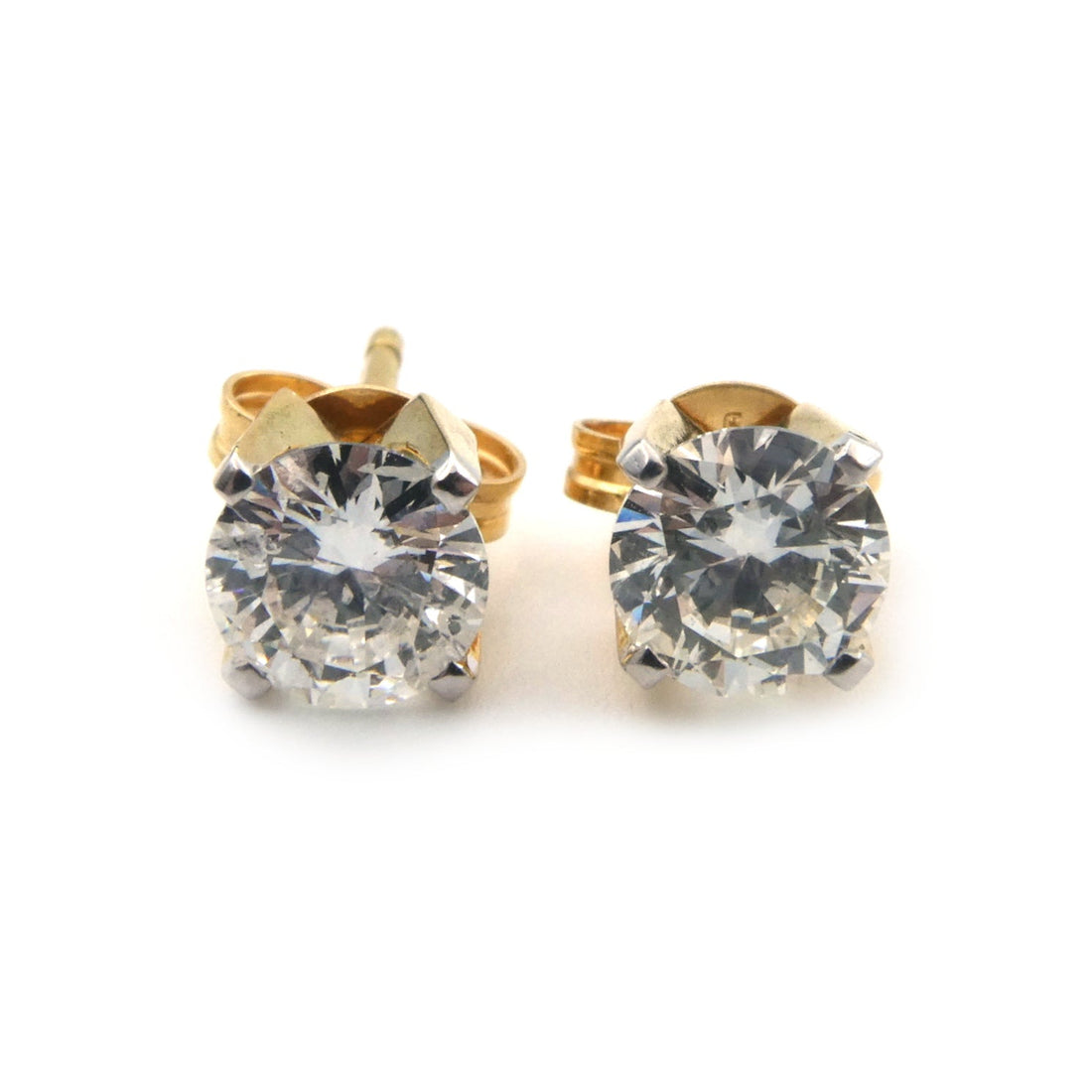 Solitaire diamond stud earrings