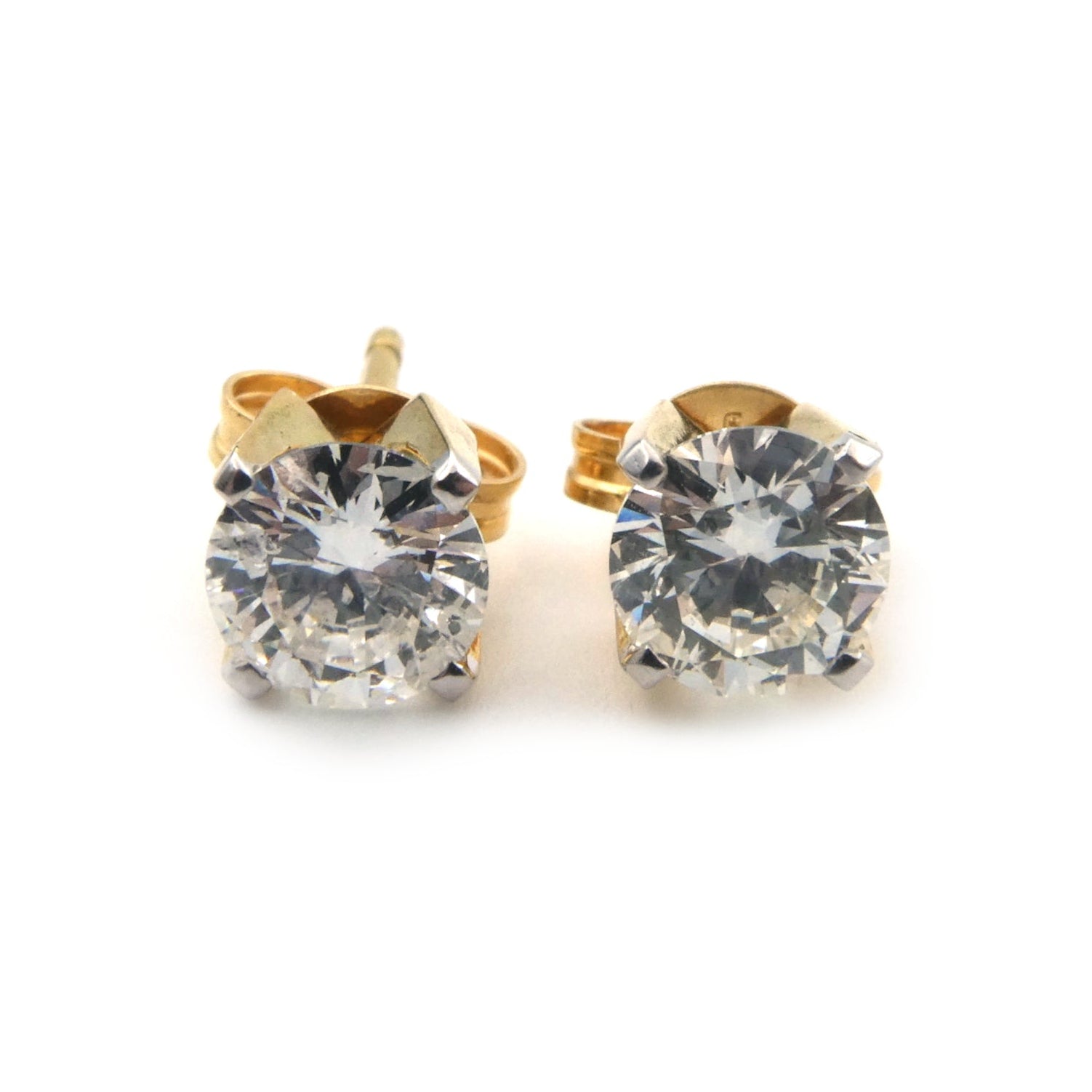 Solitaire diamond stud earrings