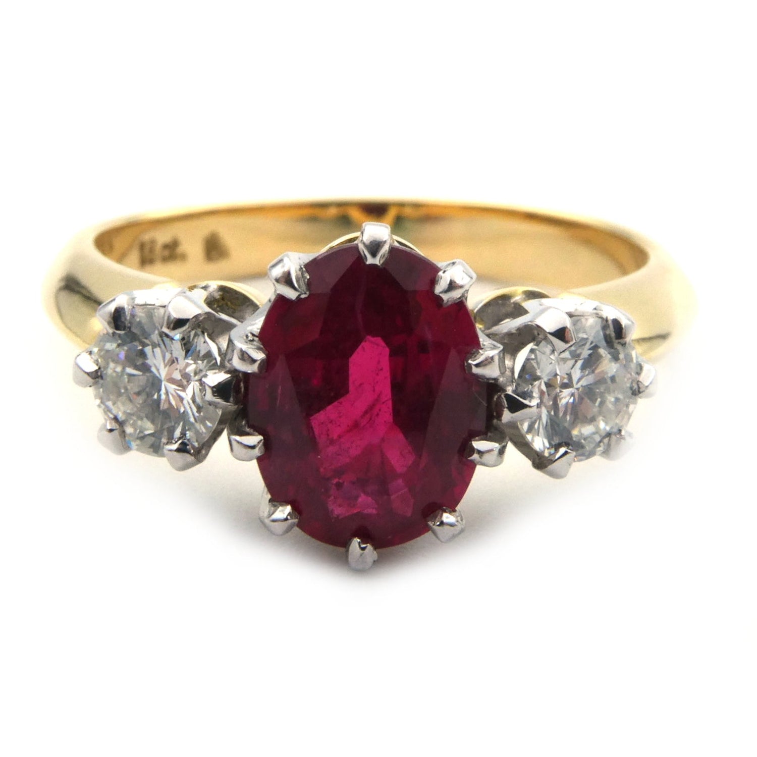 Ruby and diamond three stone ring