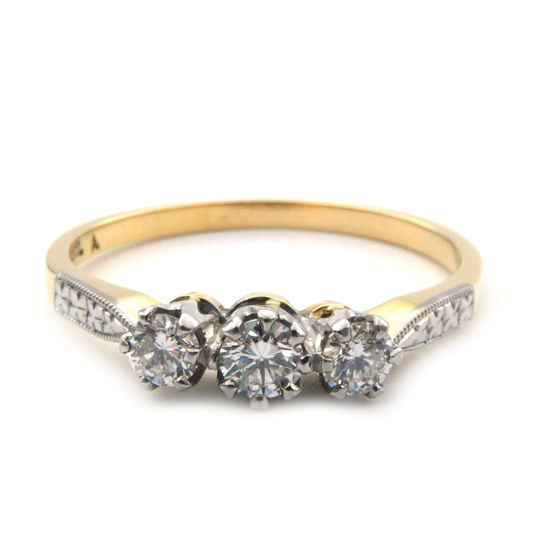 Diamond set three stone ring