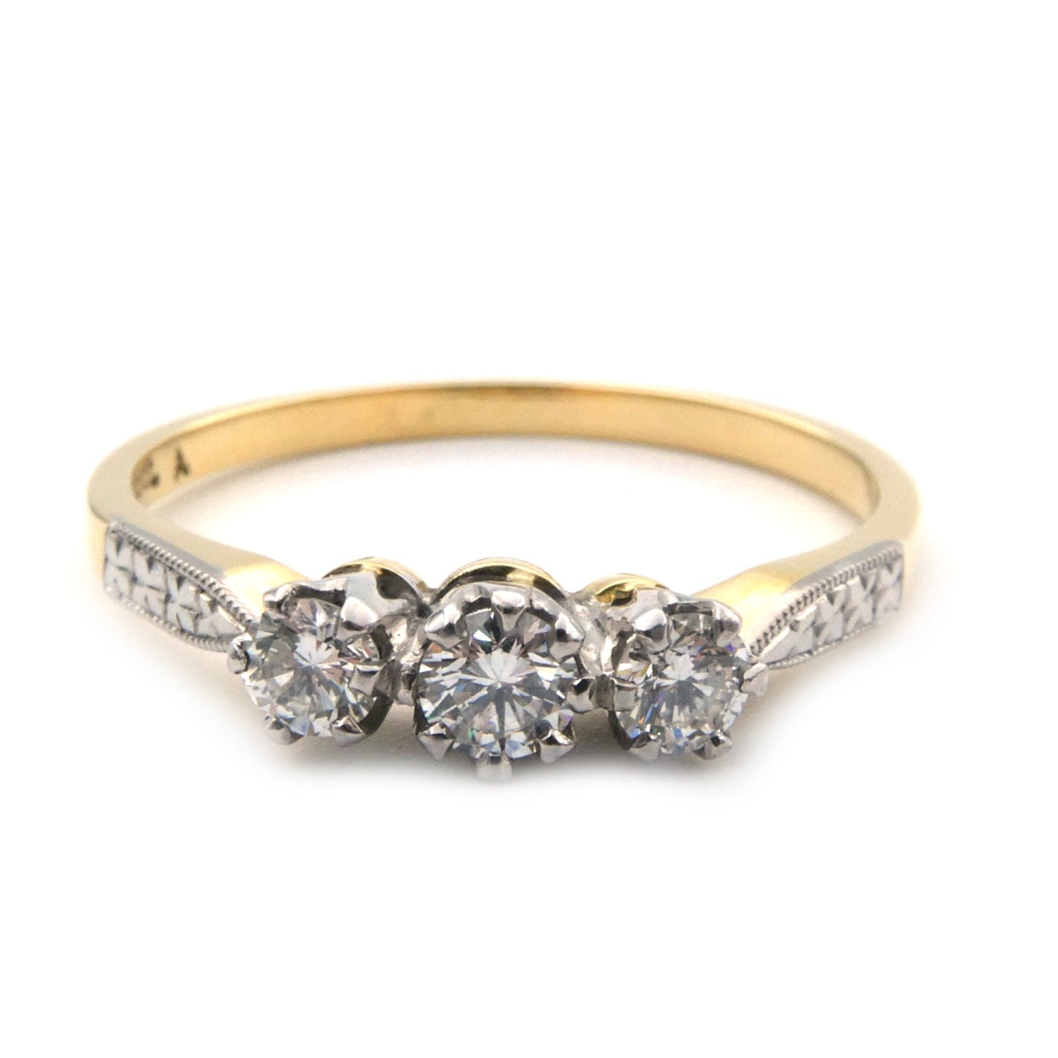 Diamond set three stone ring