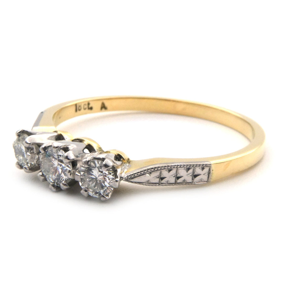 Diamond set three stone ring