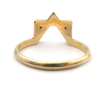 A modern black and white diamond set ring