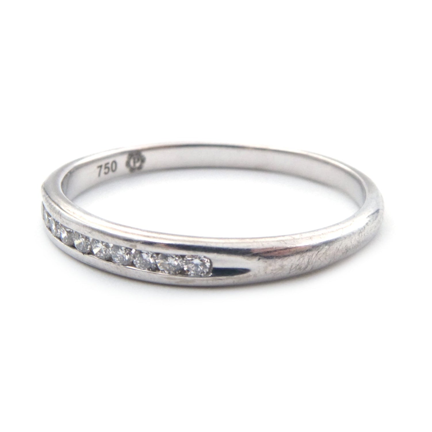 A diamond set wedding ring