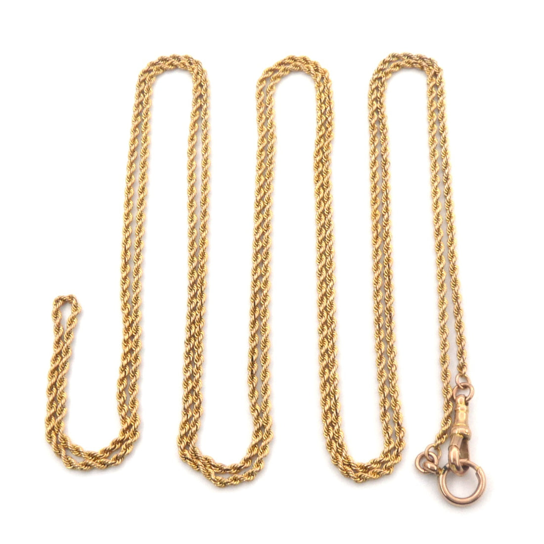 An antique yellow gold muff chain