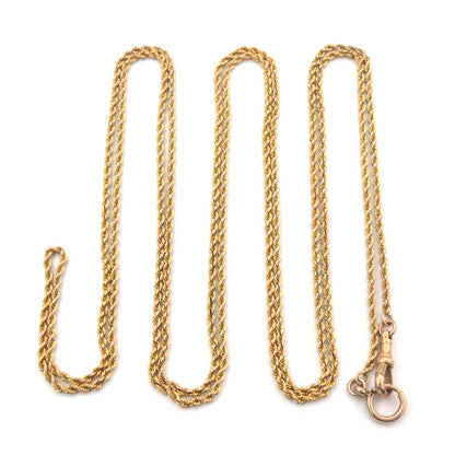 An antique yellow gold muff chain