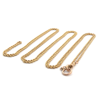 An antique yellow gold muff chain