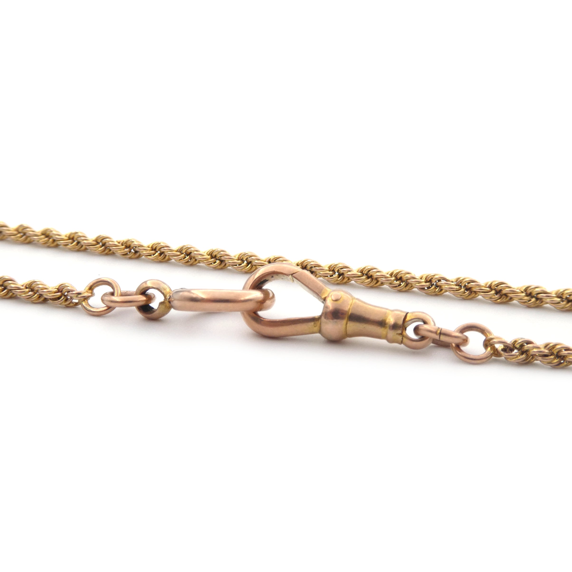 An antique yellow gold muff chain