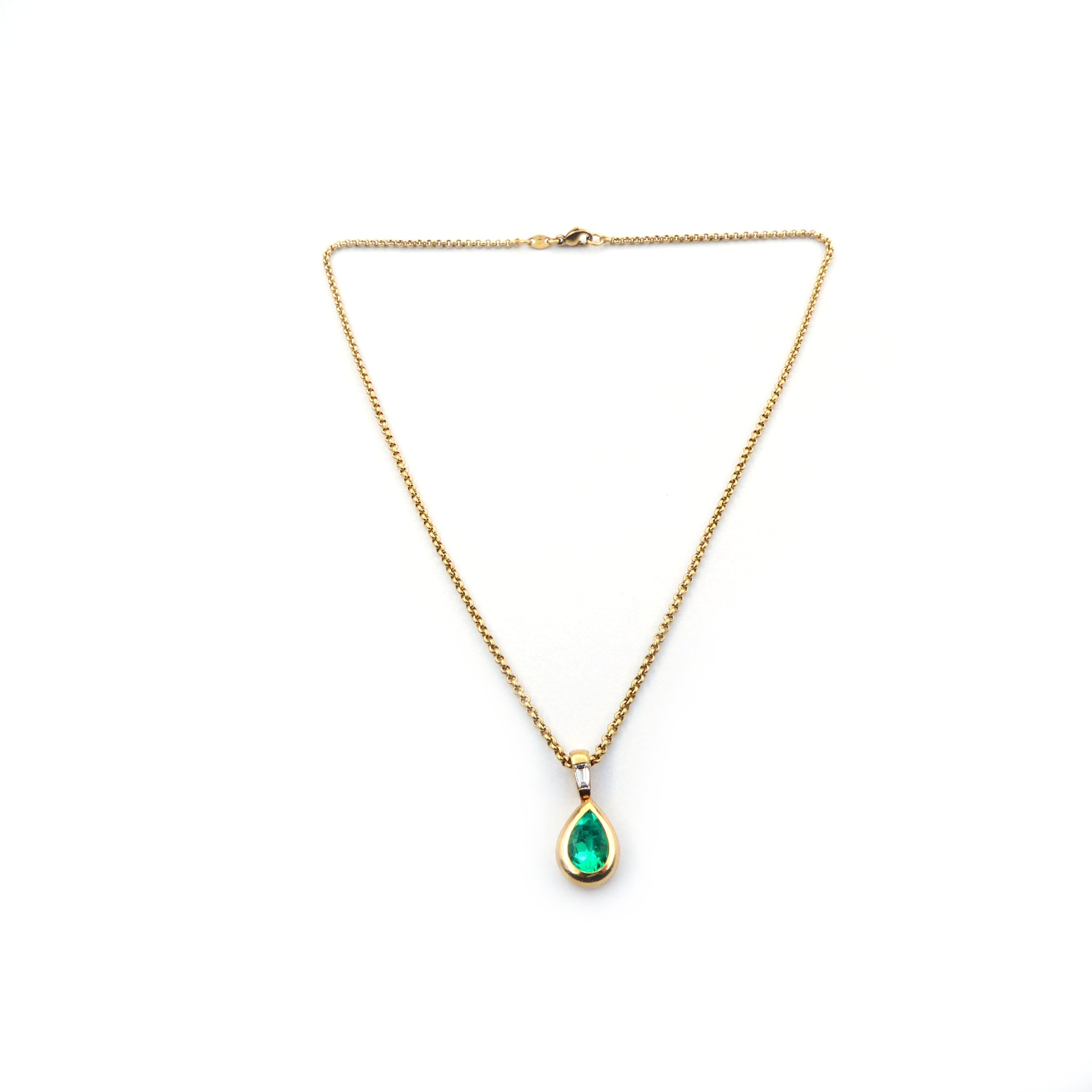 An Emerald and diamond set necklace