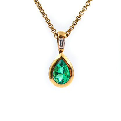 An Emerald and diamond set necklace