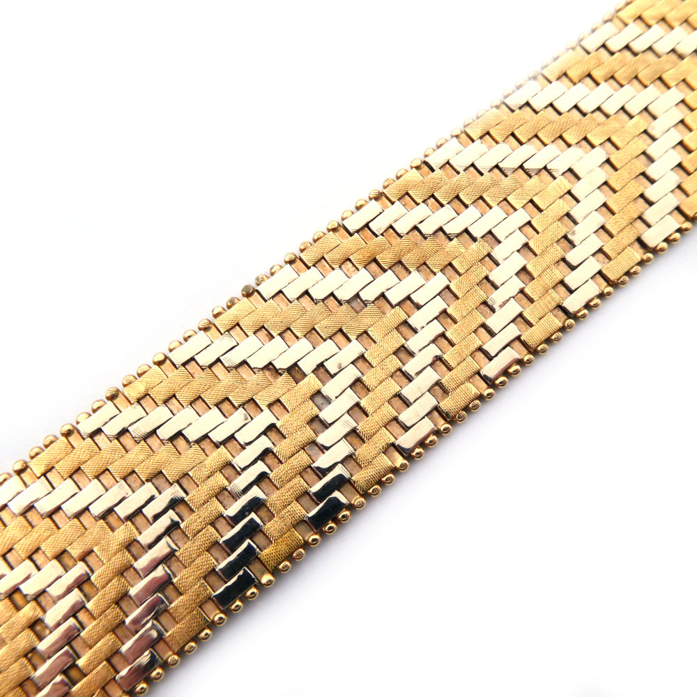 A vintage 14 carat gold mesh bracelet