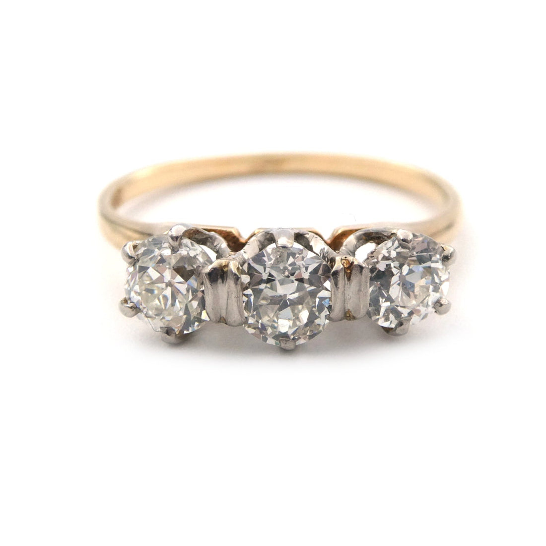 A vintage three stone diamond ring