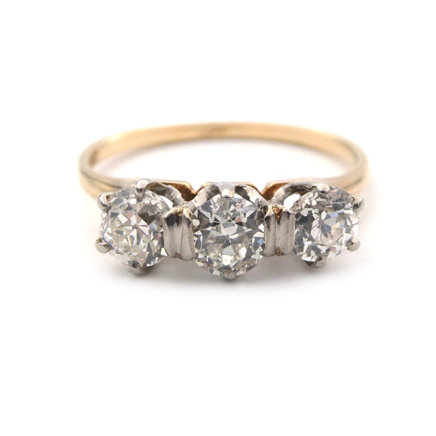 A vintage three stone diamond ring